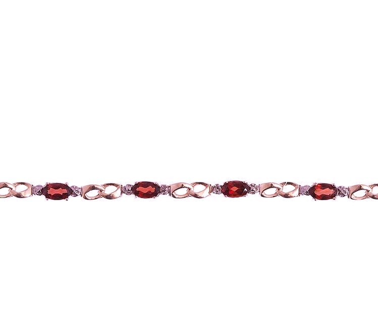 Beautifully Designed 10kt. Gold Bracelet. This design is mounted with Garnet Gemstones, and is accented with Diamonds. The gemstones are approximately 2.30ctw., and the diamonds are approximately 0.02ctw., of I clarity and H-I Color This Bracelet measures approximately 7 inches in length.  For further customization options not shown, please contact us prior to placing your order.  