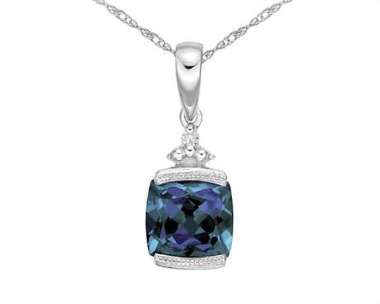 Remarkable Cushion cut Created Alexandrite Gemstone and Diamond Pendant set in 10kt White Gold. Gemstone is 6x6MM in size. Diamonds are SI clarity, H color and 0.007ctw.